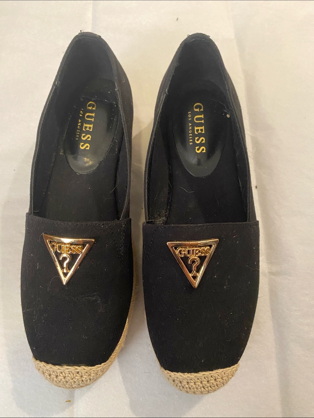 GUESS Black Espadrille Slip-On Flats with Gold Triangle Emblem